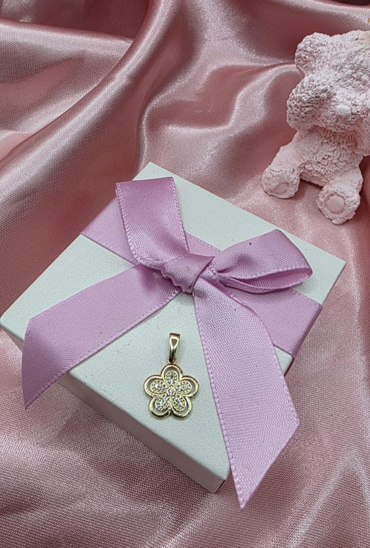 Dije florecita en oro de 10k